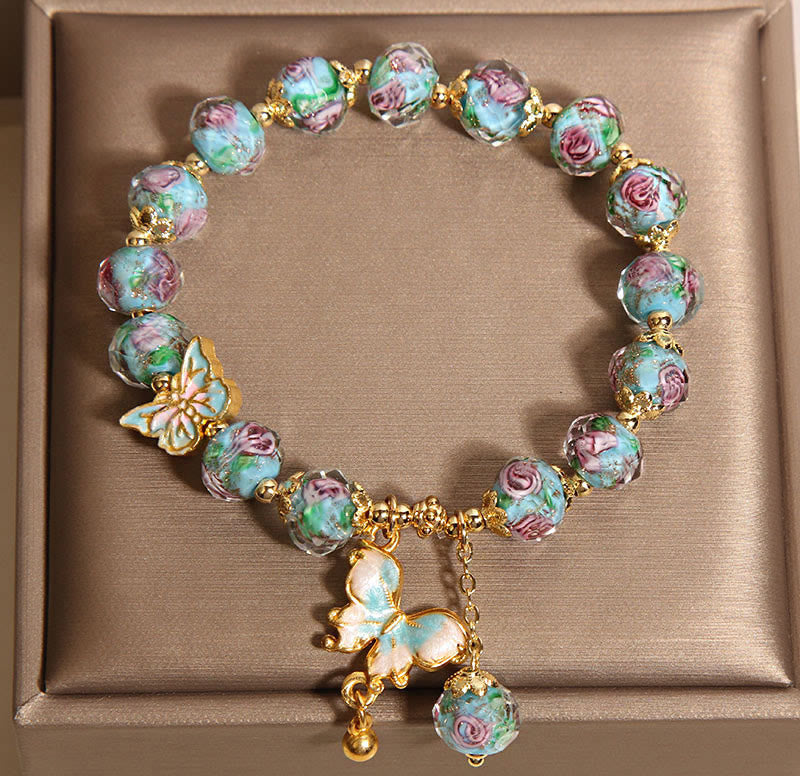 Pulsera Liuli con dije de mariposa y flor rosa de Buddha Stones - image 5