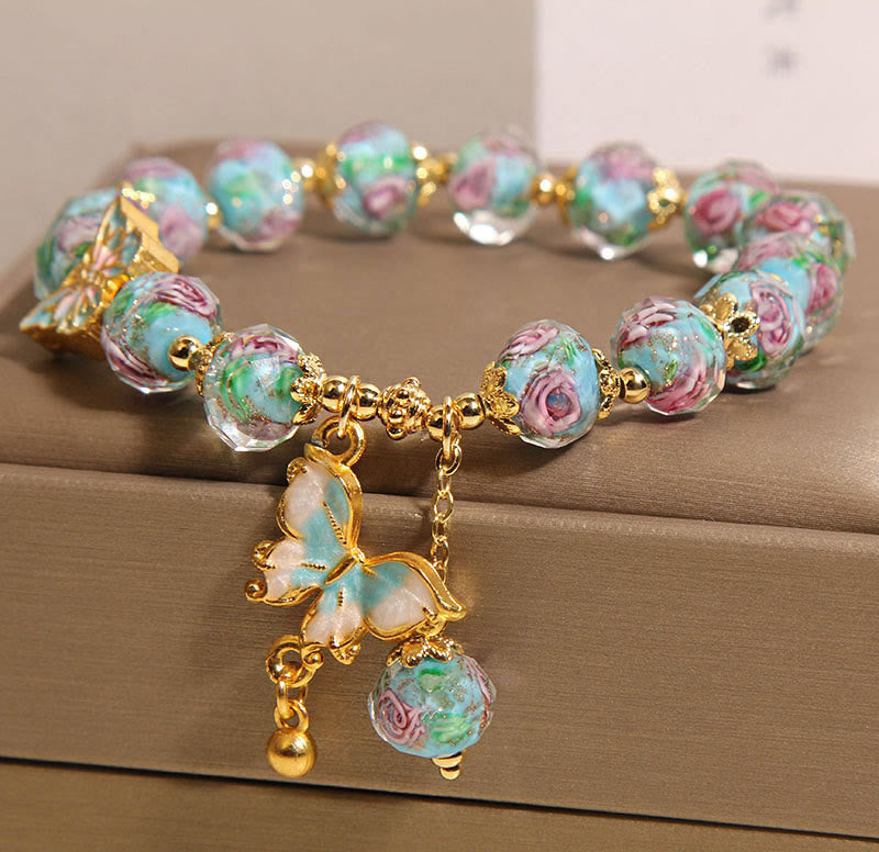 Pulsera Liuli con dije de mariposa y flor rosa de Buddha Stones - image 3