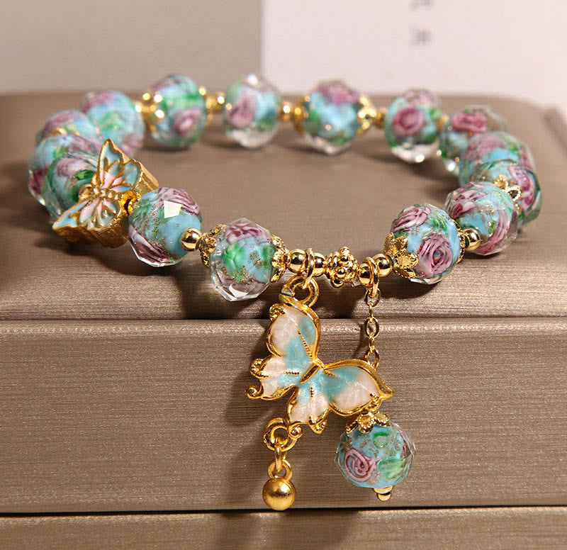 Pulsera Liuli con dije de mariposa y flor rosa de Buddha Stones - image 2