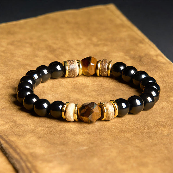Pulsera purificadora seccional con cuentas de obsidiana negra y ojo de tigre de Buddha Stones