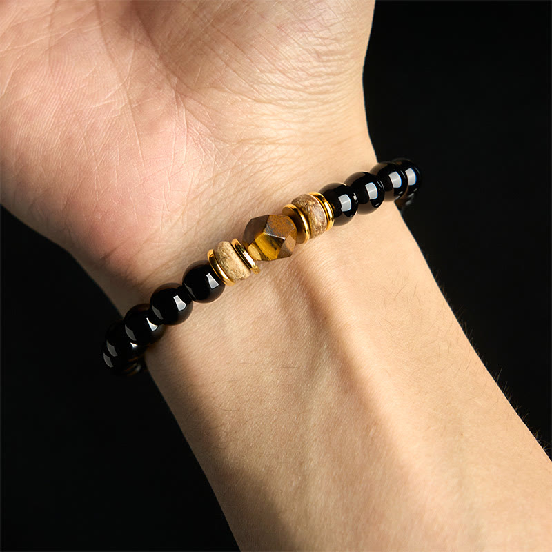 Pulsera purificadora seccional con cuentas de obsidiana negra y ojo de tigre de Buddha Stones