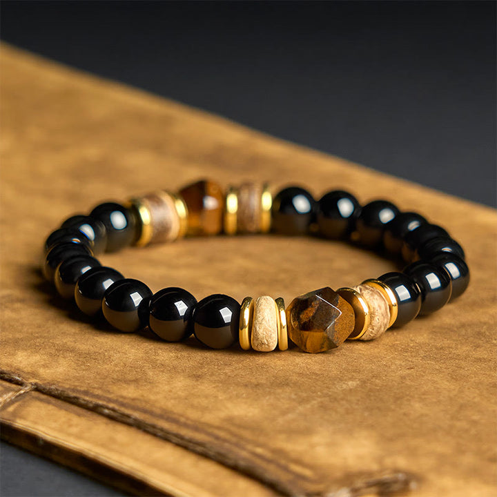 Pulsera purificadora seccional con cuentas de obsidiana negra y ojo de tigre de Buddha Stones