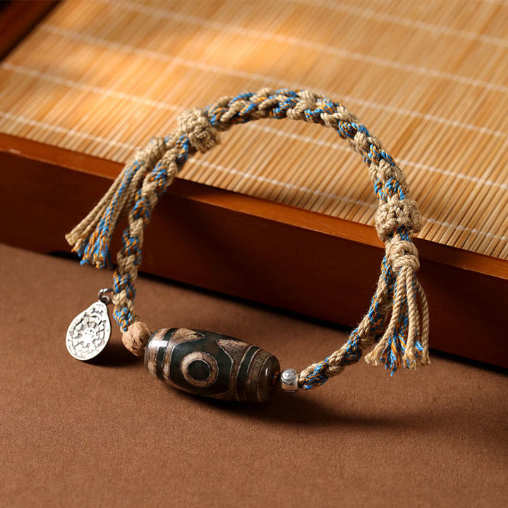 Pulsera trenzada de cuentas Dzi tibetanas hechas a mano con Buddha Stones para proteger la riqueza - Cuenta Dzi (circunferencia de la muñeca: 14-16 cm) - image 1