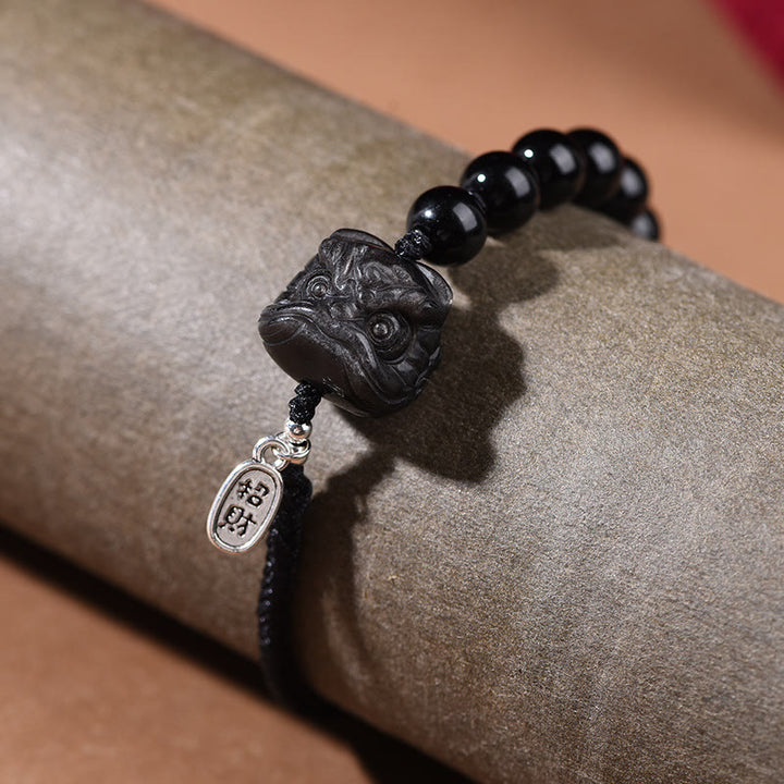 Pulsera de fuerza con Buddha Stones, obsidiana negra y brillo plateado, con un lindo gato bailando y león. - image 8