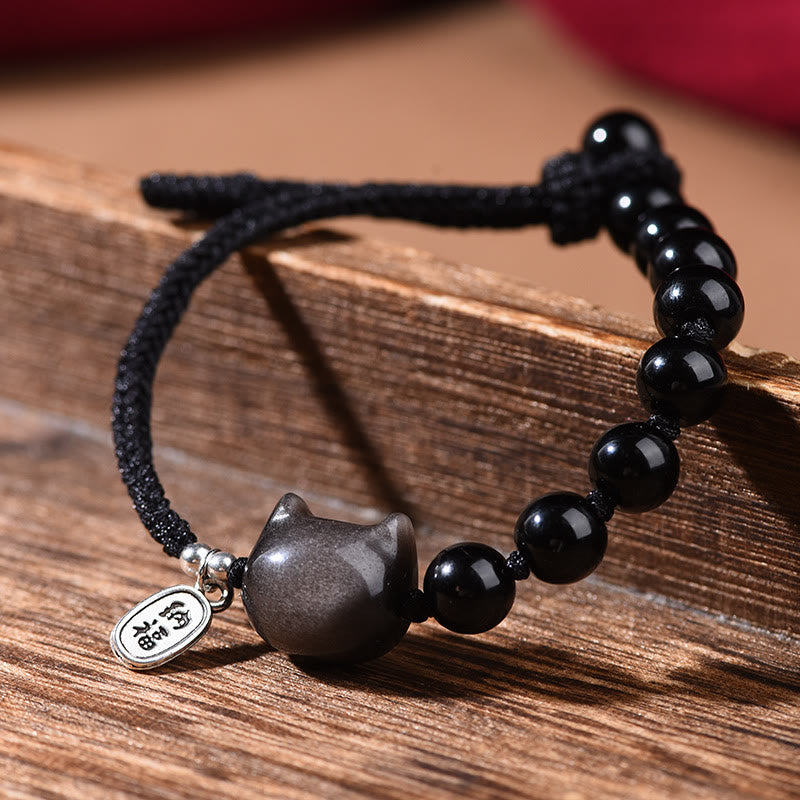 Pulsera de fuerza con Buddha Stones, obsidiana negra y brillo plateado, con un lindo gato bailando y león. - image 2