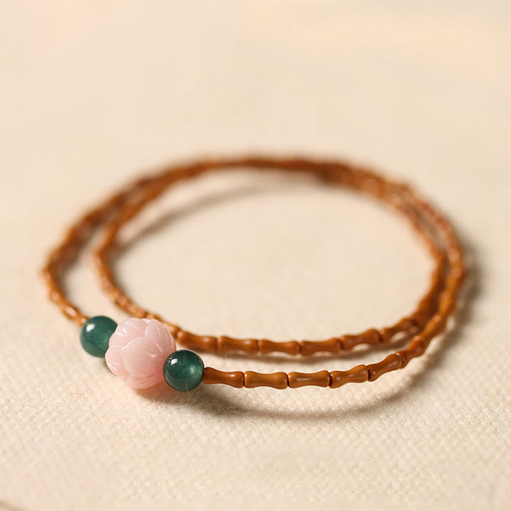 Buddha Stones Pulsera ultrafina de doble círculo con hueso de oliva y loto para una mayor fuerza interior - Hueso de aceituna (circunferencia de la muñeca: 14-15 cm) - image 0