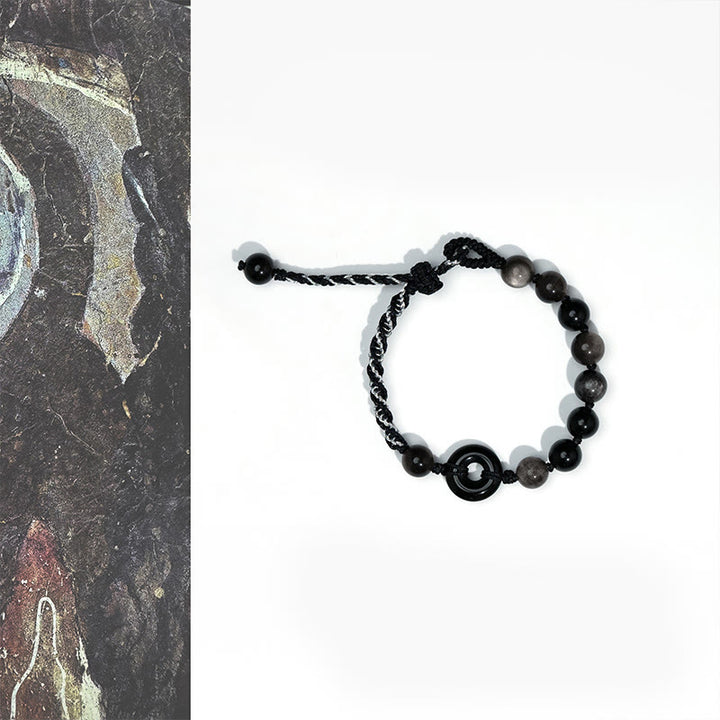 Buddha Stones Pulsera de cuerda negra purificadora con hebilla de paz de obsidiana negra natural