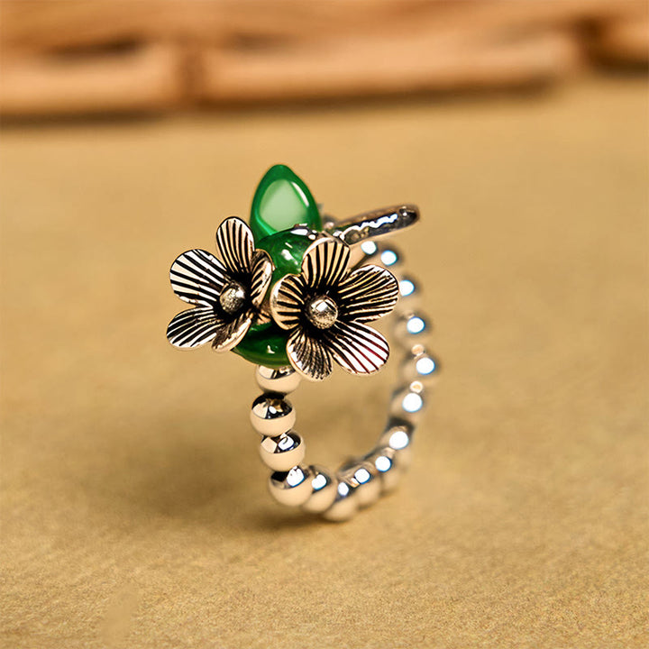 Anillo elástico de cuerda de la suerte de aleación de cobre con diseño de flores y Buddha Stones - 14-20 mm (Cuerda elástica) - image 1