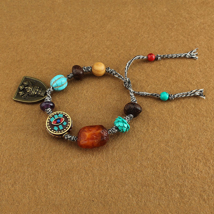 Pulsera de cuerda protectora de zakiram con Buddha Stones de Buda tibetano, turquesa y loto - image 4