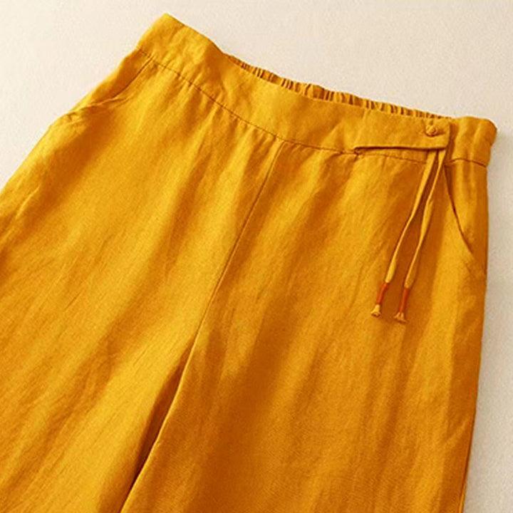 Pantalones casuales de algodón con un botón y pernera ancha para mujer, de Buddha Stones, con bolsillos y diseño de color liso - image 1