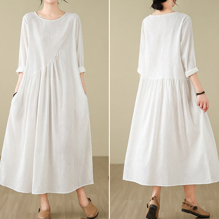 Vestido midi de lino y algodón con mangas largas irregulares, estampado floral jacquard liso y bolsillos. - image 22