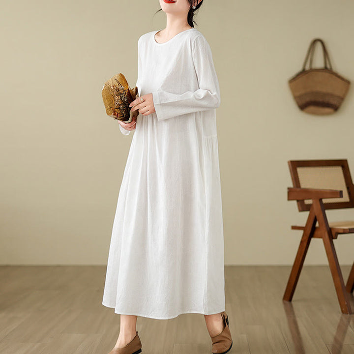 Vestido midi de lino y algodón con mangas largas irregulares, estampado floral jacquard liso y bolsillos. - image 19