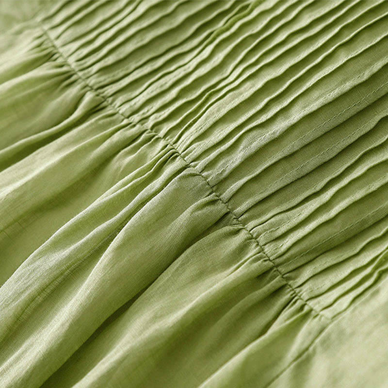 Vestido midi informal de manga corta con cuello en V, pliegues tipo acordeón y bolsillos, con estampado de Buddha Stones. - image 14