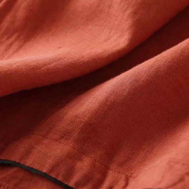Camisa informal de algodón de manga larga con cuello inclinado y tirantes para mujer con flores bordadas de Buddha Stones - image 3
