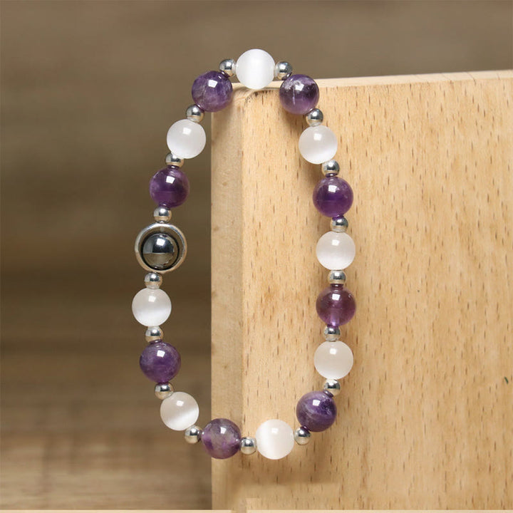 Pulsera de equilibrio con cuentas de ojo de gato blancas y amatista natural de Buddha Stones - image 5