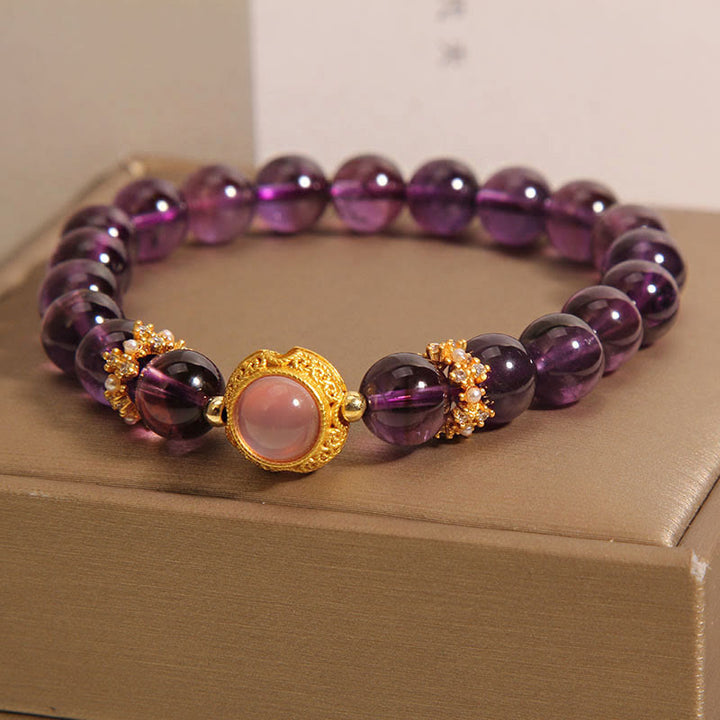 Pulsera curativa con cuentas de cuarzo fresa y amatista natural de Buddha Stones - image 2