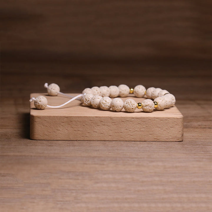 Pulsera de piedra de lava blanca con símbolo Om y Buddha Stones para la calma y la curación - image 4