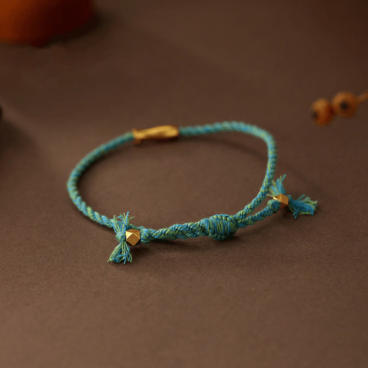Pulsera de cuerda de cobre con Buddha Stones y pez koi de la suerte - image 2