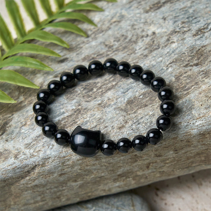 Pulsera de protección de ónix negro natural con Buddha Stones y gato negro - image 10