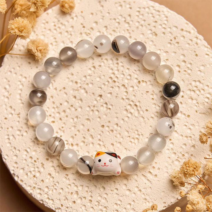Pulsera de poder con cabeza de gatito de cerámica y piedra de ágata natural de Buddha Stones y gato calicó - image 1