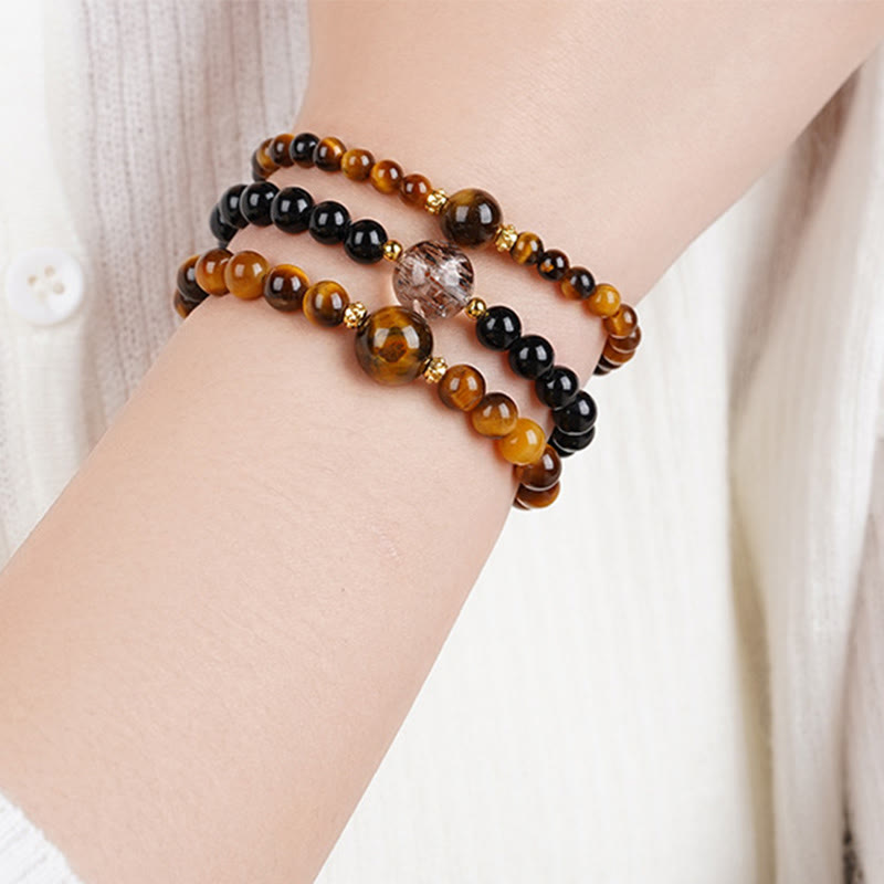Pulsera de cuentas de coraje de obsidiana negra y ojo de tigre de Buddha Stones - image 11