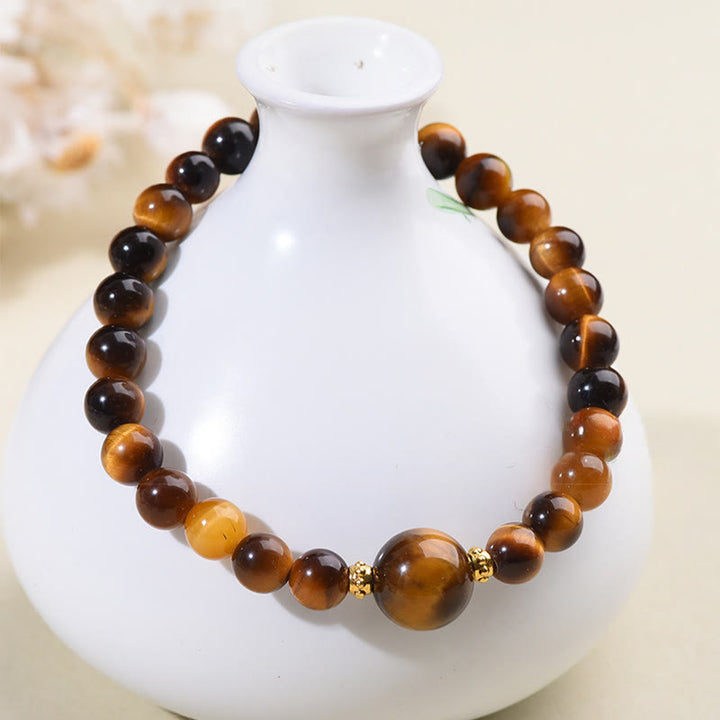 Pulsera de cuentas de coraje de obsidiana negra y ojo de tigre de Buddha Stones - image 3