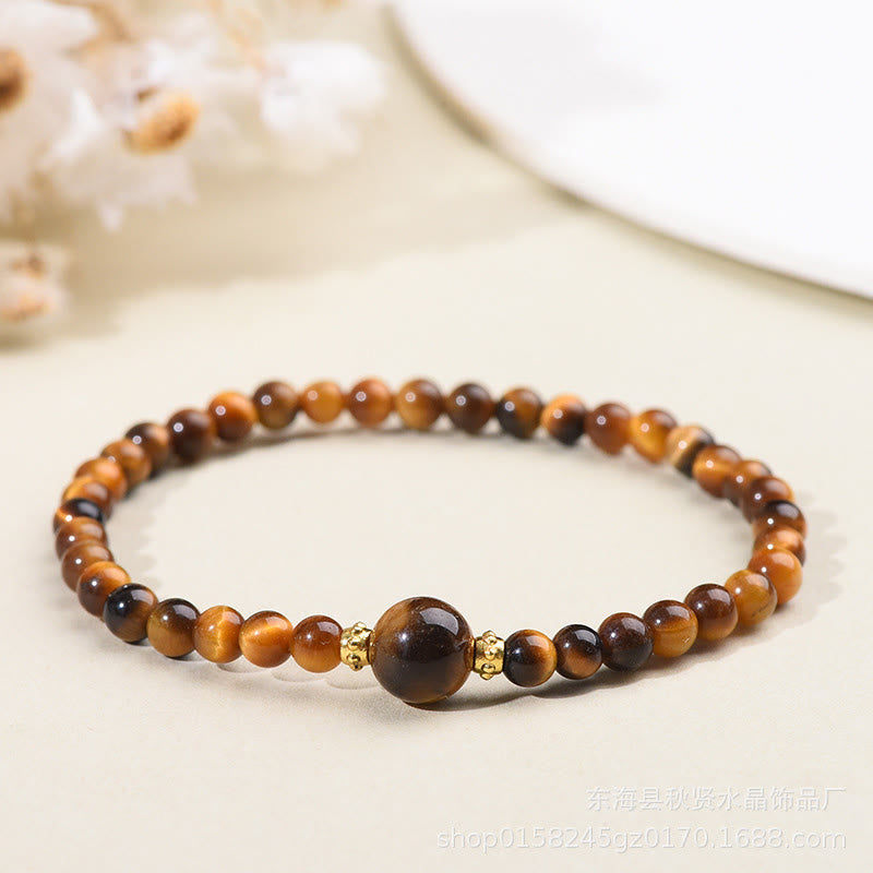 Pulsera de cuentas de coraje de obsidiana negra y ojo de tigre de Buddha Stones - Ojo de tigre - 4 mm - image 1