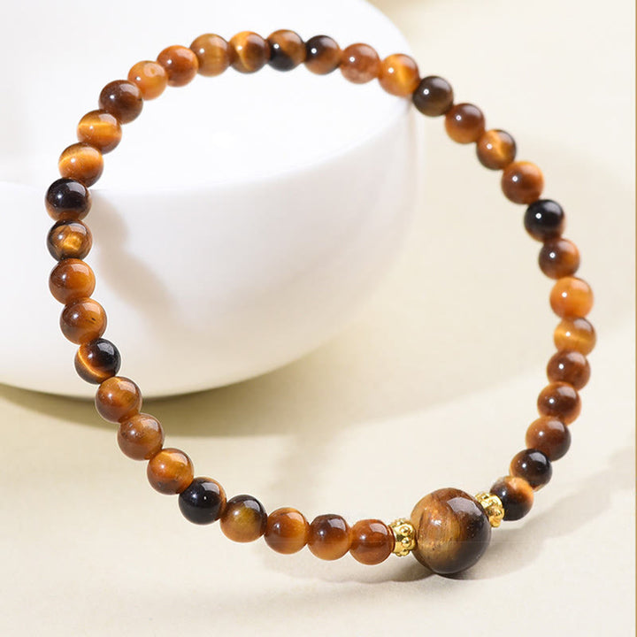 Pulsera de cuentas de coraje de obsidiana negra y ojo de tigre de Buddha Stones - image 4