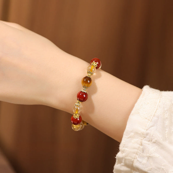 Pulsera de la riqueza con cuentas de ojo de tigre y cuarzo rutilado dorado natural de Buddha Stones - image 9