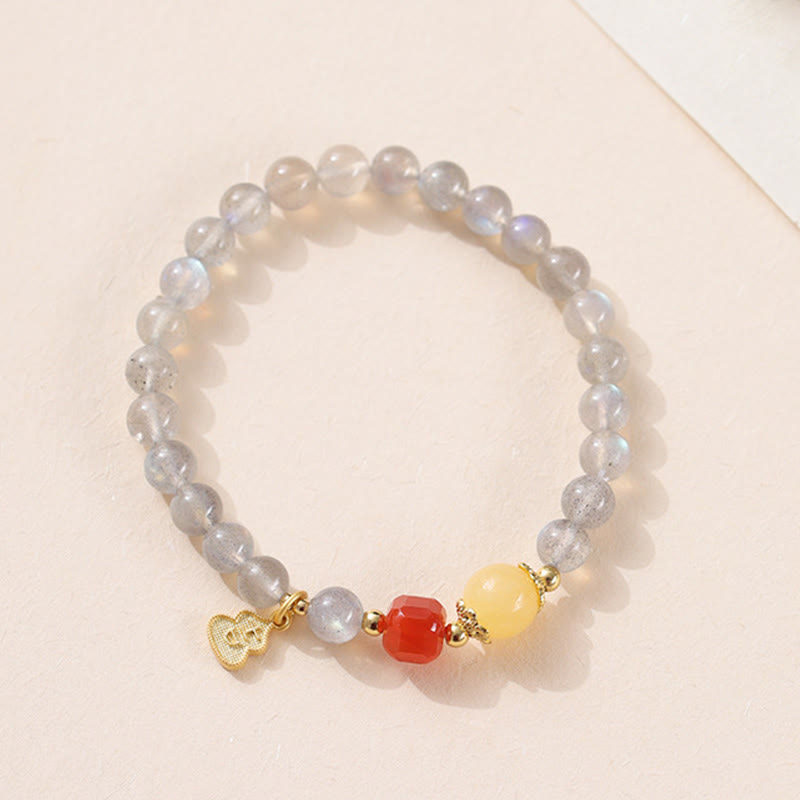 Pulsera con encanto de loto, piedra lunar natural y Buddha Stones - image 11