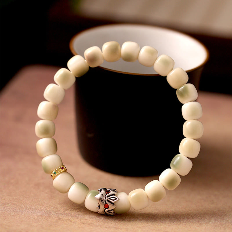 Pulsera de sabiduría Garuda de cobre y latón martillado con semillas de Bodhi y Buddha Stones - Semilla de Bodhi y Garuda (circunferencia de la muñeca: 15-17 cm) - image 0