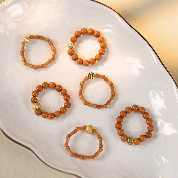 Anillo de fuerza interior con moneda de cobre y cuentas de hueso de olivo de Buddha Stones - image 18