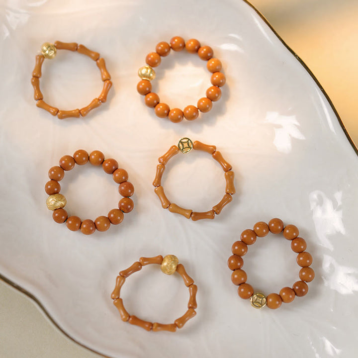Anillo de fuerza interior con moneda de cobre y cuentas de hueso de olivo de Buddha Stones - image 17