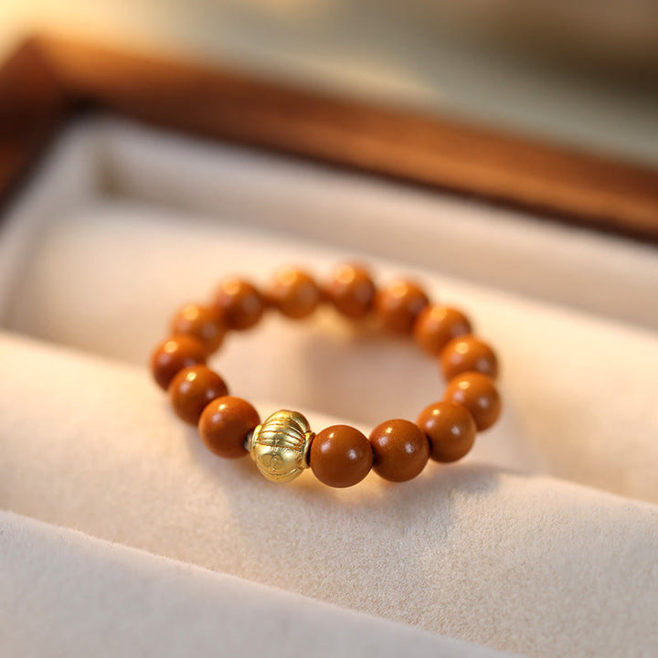 Anillo de fuerza interior con moneda de cobre y cuentas de hueso de olivo de Buddha Stones - image 15