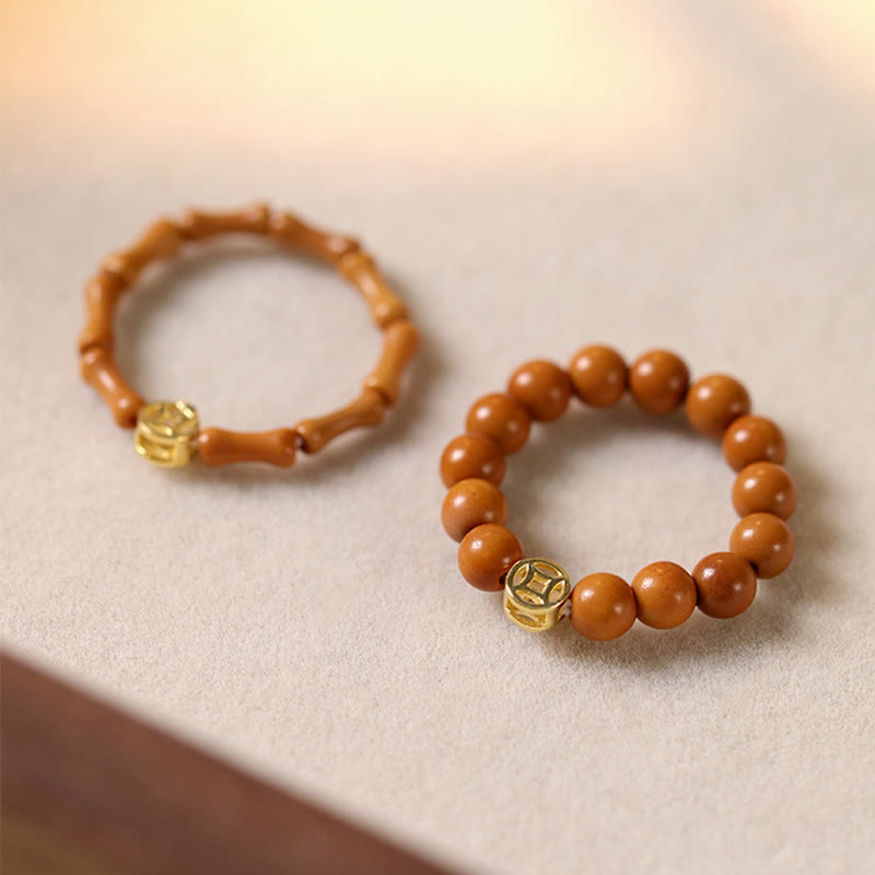 Anillo de fuerza interior con moneda de cobre y cuentas de hueso de olivo de Buddha Stones - image 0