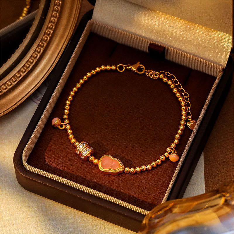 Pulsera de la riqueza con cuentas de calabaza y Buddha Stones bañadas en cobre y latón, bañadas en oro de 24 quilates - image 1