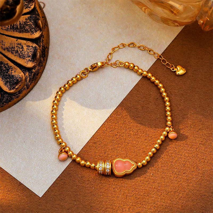 Pulsera de la riqueza con cuentas de calabaza y Buddha Stones bañadas en cobre y latón, bañadas en oro de 24 quilates - image 2