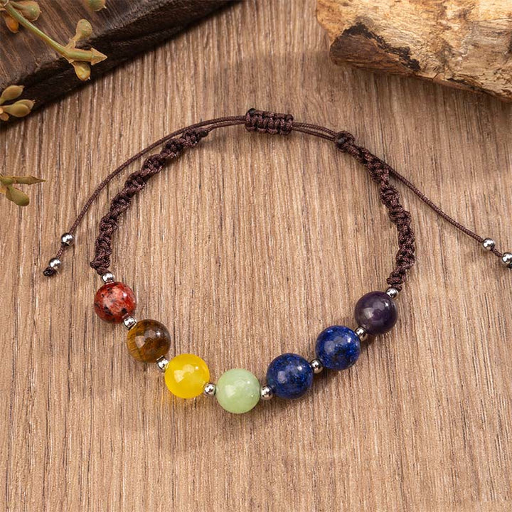 Pulsera de cuerda con Buddha Stones, cristales naturales variados, ojo de tigre y amatista. - image 3