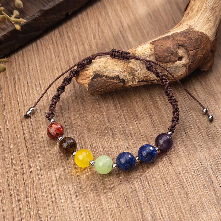 Pulsera de cuerda con Buddha Stones, cristales naturales variados, ojo de tigre y amatista. - Cuerda marrón y varios cristales (circunferencia de la muñeca: 15-26 cm) - image 0