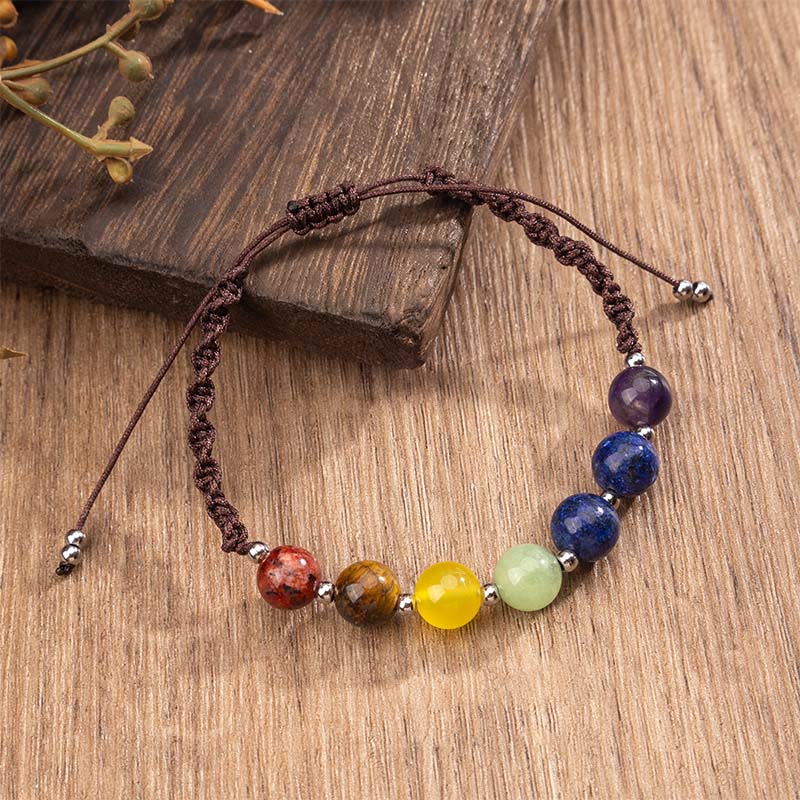Pulsera de cuerda con Buddha Stones, cristales naturales variados, ojo de tigre y amatista. - image 1