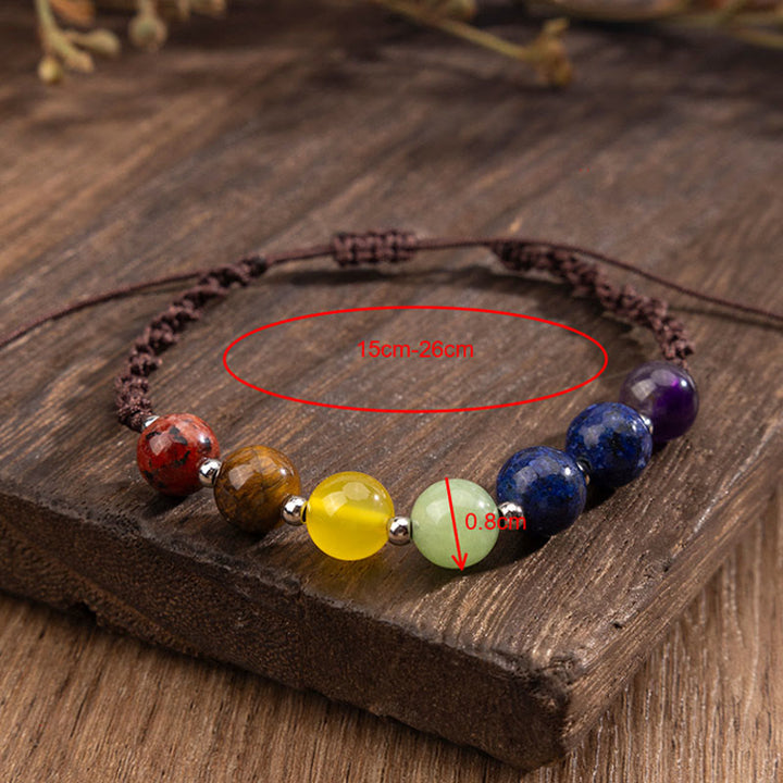 Pulsera de cuerda con Buddha Stones, cristales naturales variados, ojo de tigre y amatista. - image 8