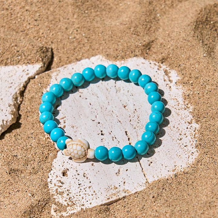 Pulsera de la sabiduría de ágata craquelada turquesa y tortuga marina de piedra natural de Buddha Stones - image 1