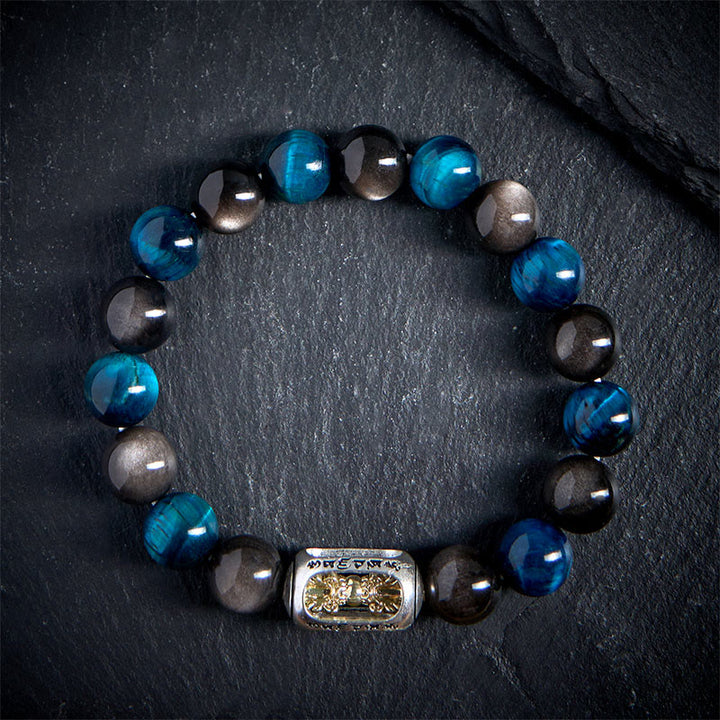 Pulsera relajante Om Mani Padme Hum con obsidiana azul, ojo de tigre y brillo plateado natural de Buddha Stones - image 1
