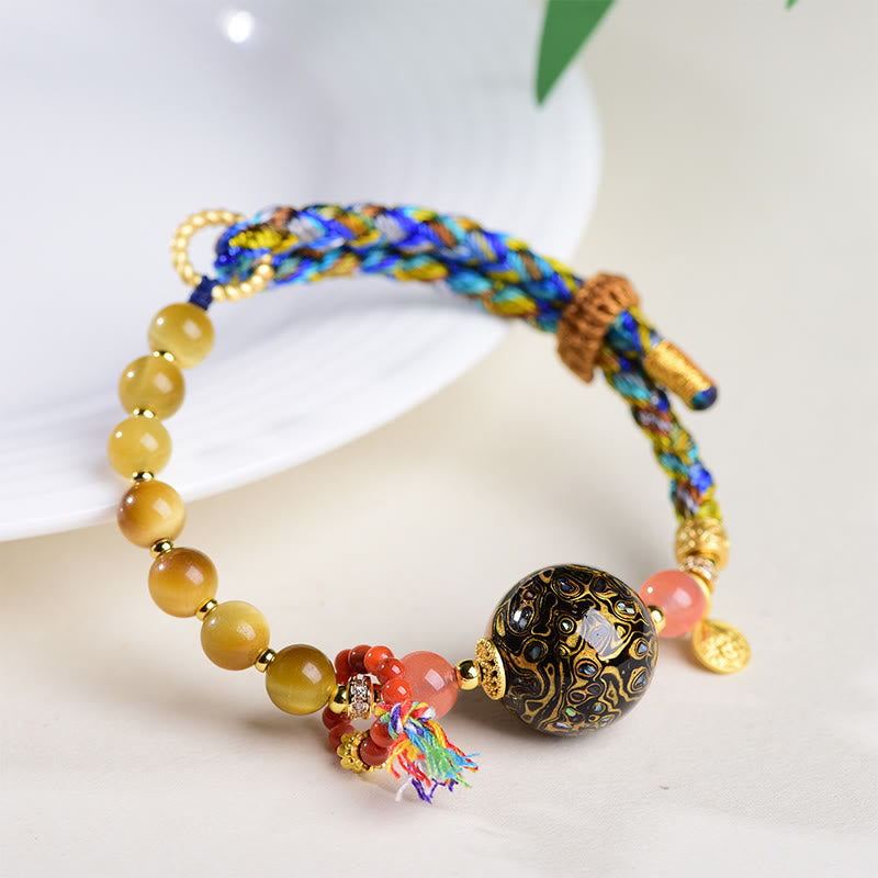 Pulsera de protección de ojo de tigre tejida a mano con cuentas de laca tibetana de Buddha Stones - image 3