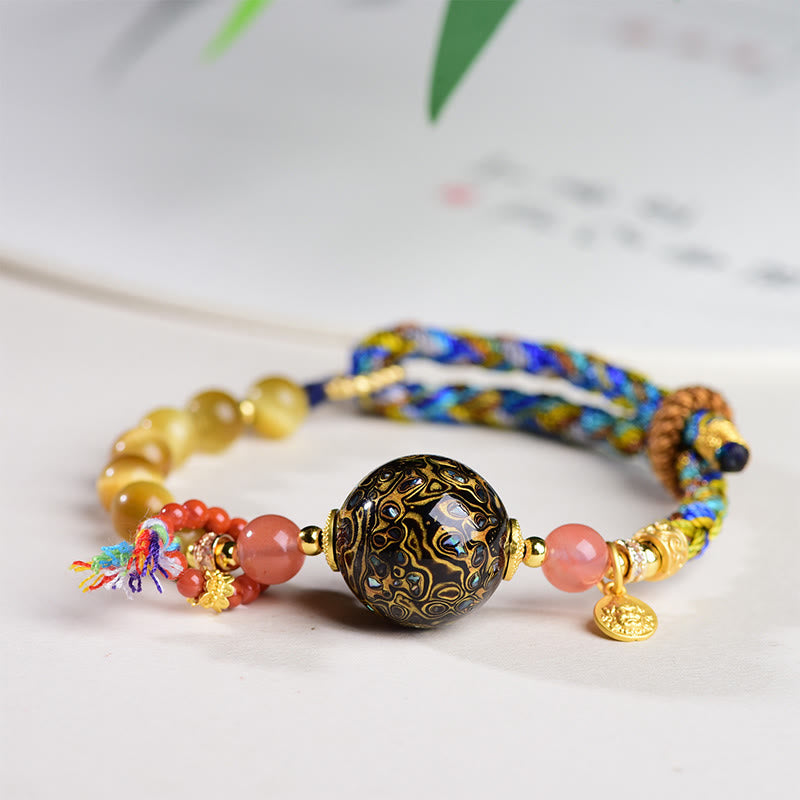 Pulsera de protección de ojo de tigre tejida a mano con cuentas de laca tibetana de Buddha Stones - Cuentas de laca y ojo de tigre (circunferencia de la muñeca: 15-25 cm) - image 0