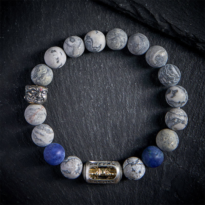 Buddha Stones con jaspe gris natural y sodalita, Om Mani Padme Hum, con cara de Buda curativa - 20 centímetros - image 0