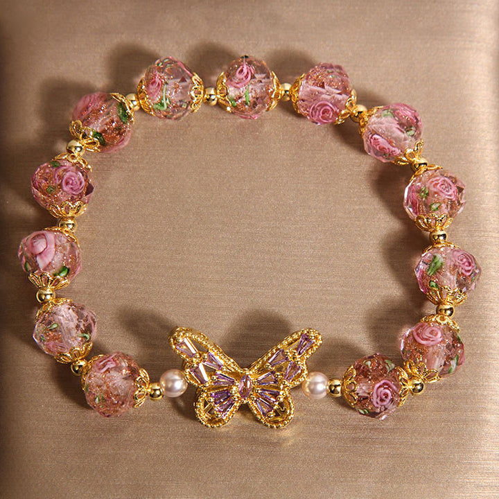 Pulsera de cristal rosa cálido con diseño de mariposa natural y Buddha Stones - image 2