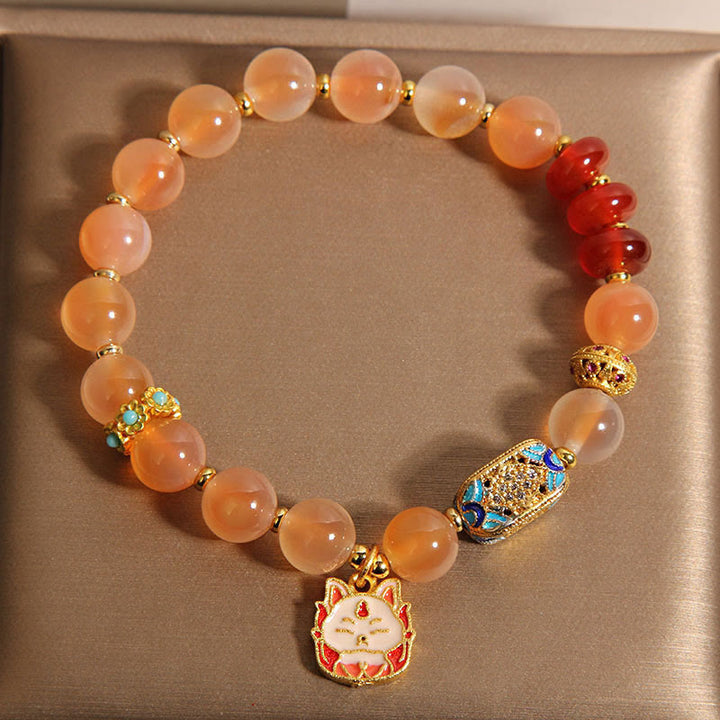 Pulsera curativa de ágata naranja y caramelo con zorro de nueve colas de Buddha Stones - image 4