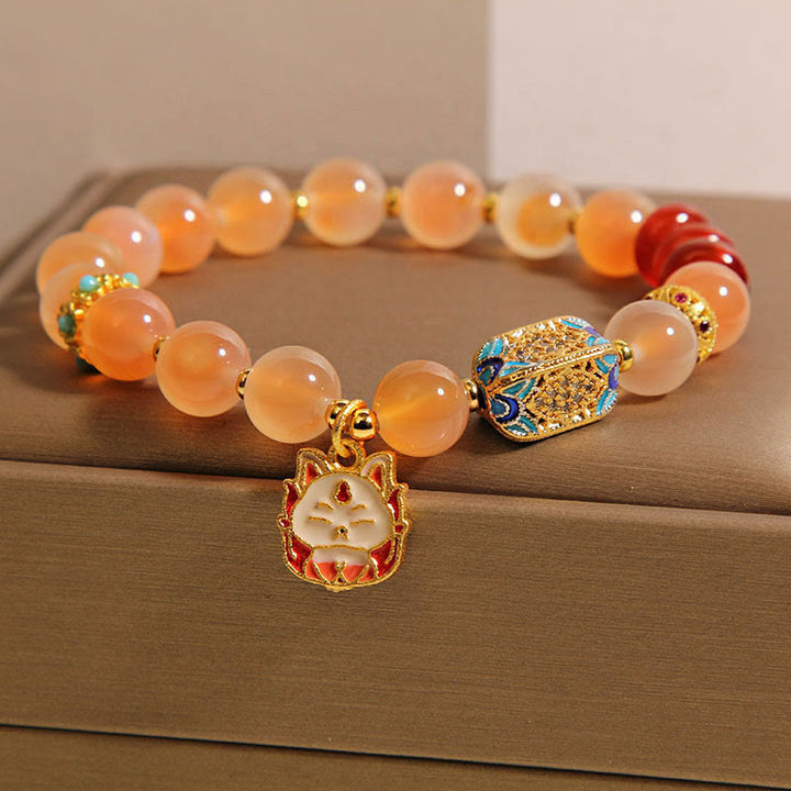 Pulsera curativa de ágata naranja y caramelo con zorro de nueve colas de Buddha Stones - image 2