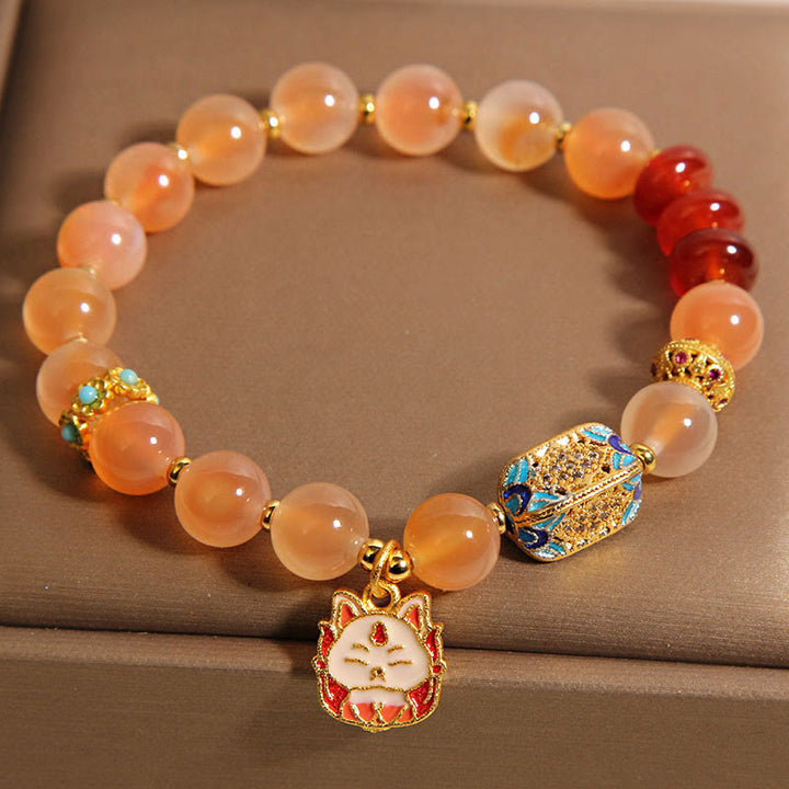 Pulsera curativa de ágata naranja y caramelo con zorro de nueve colas de Buddha Stones - image 3